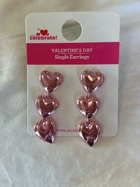 Triple Heart Drop Earrings in Metallic Pink